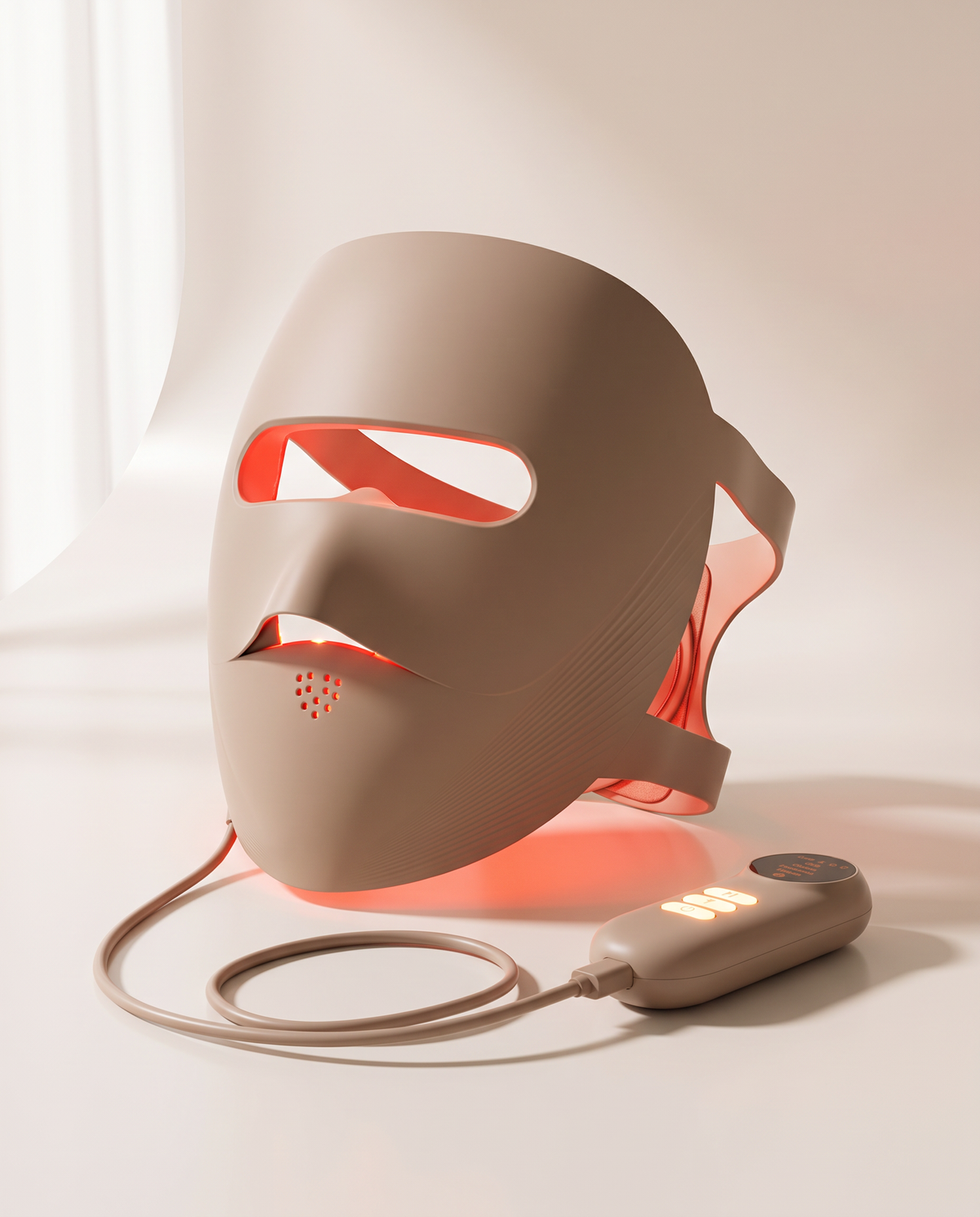 Clinaray LED light therapy mask in Beige with red light on, standing on a porcelain surface